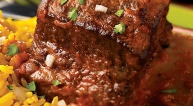 chipotle braised beef ribs with yellow rice