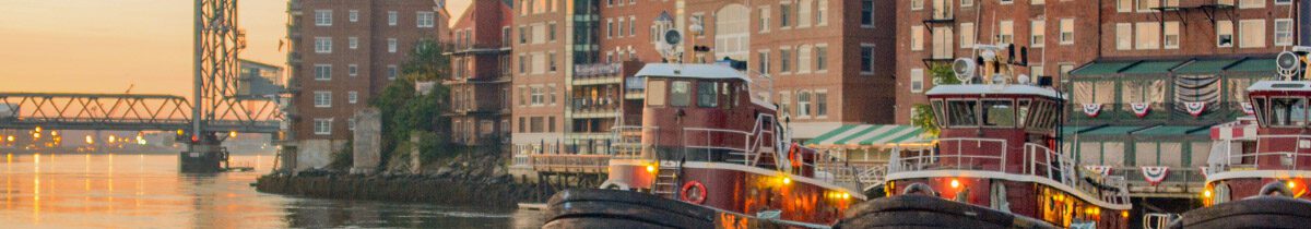 bridge, building and tugboats