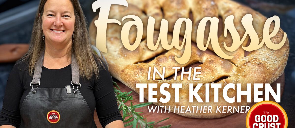 smiling female chef over graphic image of baked fougasse bread on wooden platter