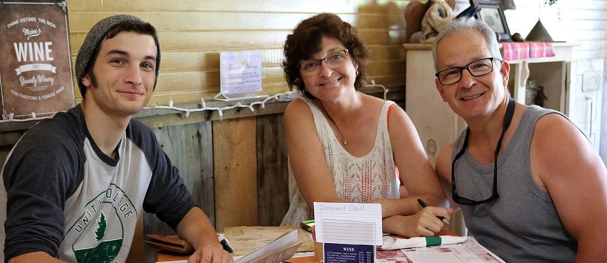 three smiling customers