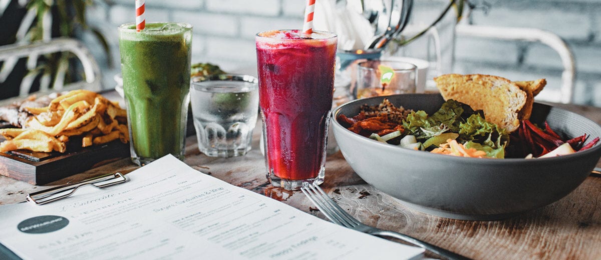 table with menu smoothies and salad