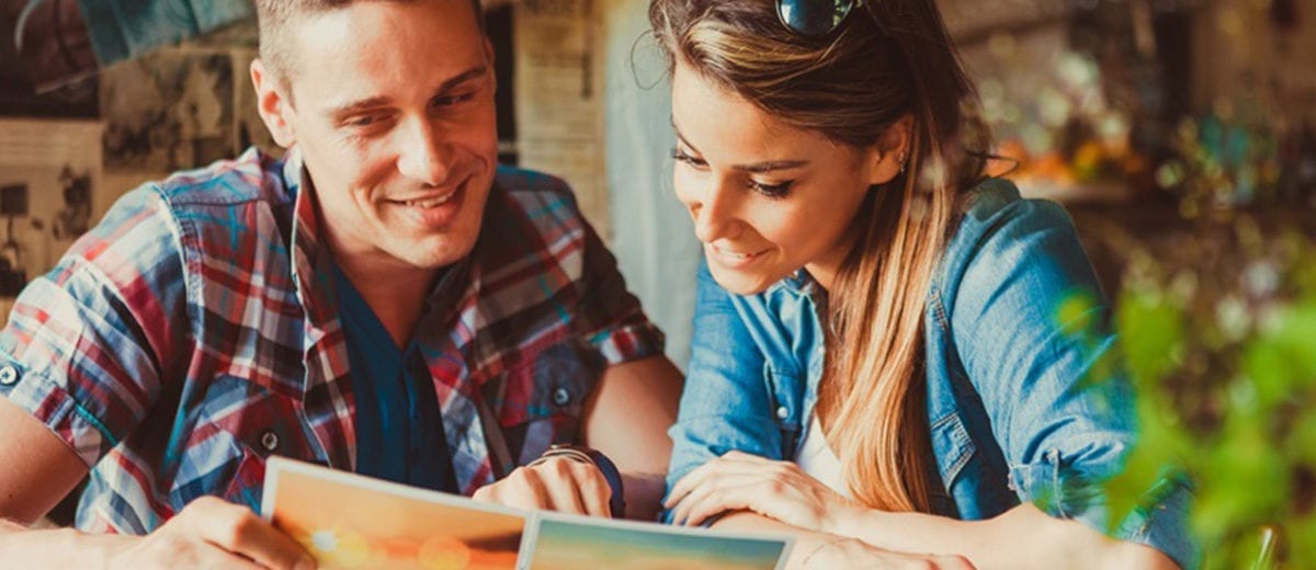 couple looking at menu, man and woman